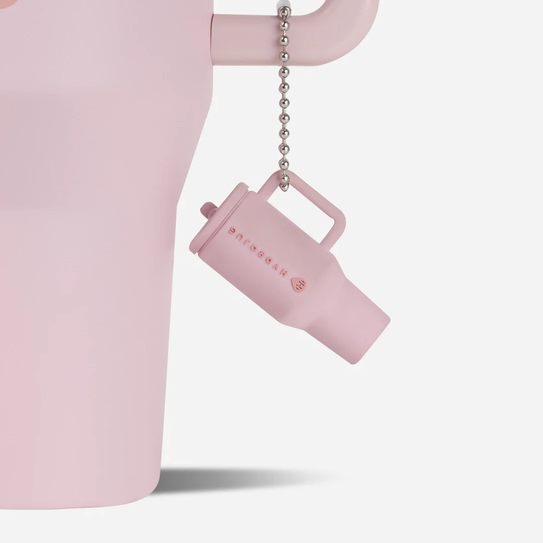 traveler-keychain-j0 Web-TravelerKeychainPhotos-PinkSand2.webp